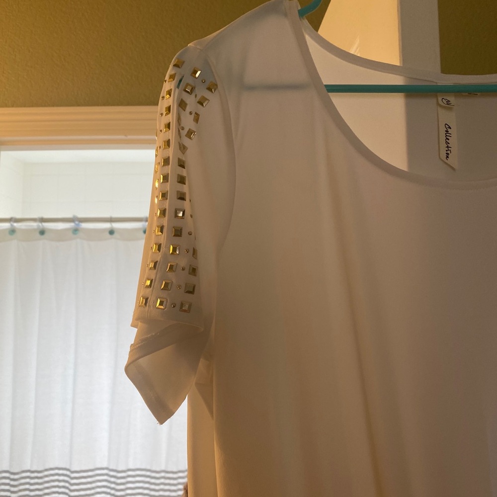 White top with embellishments